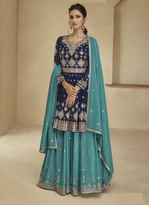 Garb These Designer Sharara Suits in Fine Colored Pair With Dupatta.These Top And Dupatta Are Fabricated On Georgette Pair With Georgette Bottom.Its Beautified With Blomming Color,Designer Floral Embroidery Work