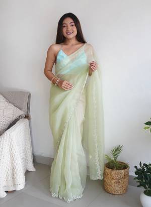 Attrective Looking These Party Wear Saree in Fine Colored.These Saree Are Organza And Blouse is Fabricated On Art Silk.Its Beautified With Designer Heavy Border Khatli Work.