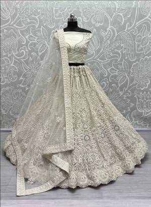 For A Fancy Designer Look,Grab These Lehenga Choli With Dupatta in Fine Colored.These Lehenga And Choli Are Net And Dupatta Are Fabricated On Soft Net Pair.Its Beautified With Designer Multy Thread, Sequance Embroidery Work.