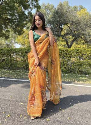 Attrective Looking These Party Wear Saree in Fine Colored.These Saree Are Organza And Blouse is Fabricated On Art Silk.Its Beautified With Designer Floral Hand Work,Lace Border.