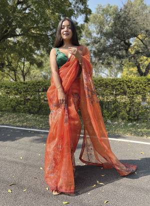 Attrective Looking These Party Wear Saree in Fine Colored.These Saree Are Organza And Blouse is Fabricated On Art Silk.Its Beautified With Designer Floral Hand Work,Lace Border.