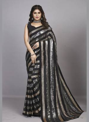 Attrective Look These Party Wear Saree in Fine Colored.These Saree Are Georgette And Blouse is Mono Banglori Fabricated.Its Beautified With Designer Heavy Sequance Embroidery Work Lace Border.