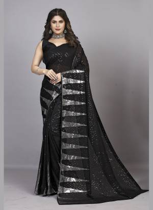 Attrective Look These Party Wear Saree in Fine Colored.These Saree Are Georgette And Blouse is Mono Banglori Fabricated.Its Beautified With Designer Heavy Sequance Embroidery Work Lace Border.