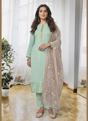 Garb These Designer Suits in Fine Colored Pair With Dupatta.These Top And Dupatta Are Fabricated On Georgette Pair With Dull Santoon Bottom.Its Beautified With Designer Sequance,Thread Embroidery Work