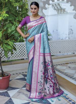 Attrective Looking These Party Wear Saree in Fine Colored.These Saree And Blouse is Fabricated On Soft Kanjivaram Silk.Its Beautified With Paithani Wevon Designer.