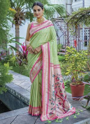 Attrective Looking These Party Wear Saree in Fine Colored.These Saree And Blouse is Fabricated On Soft Kanjivaram Silk.Its Beautified With Paithani Wevon Designer.