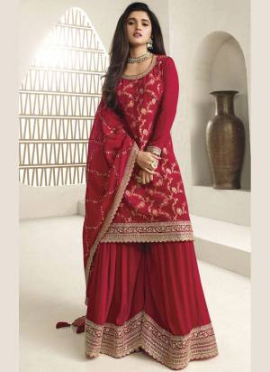 Attrective Looking These Party Wear Sharara Suit in Fine Colored Pair With Bottom And Dupatta.These Top And Dupatta Are Fabricated On Viscose Chinon Jacquard Pair With Viscose Chinon Bottom.Its Beautified With Wevon Jacquard Designer With Embroidery Work.