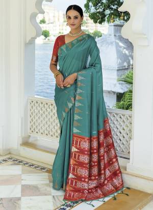 Looking These Festive Wear Saree in Fine Colored.These Saree And Blouse is Fabricated On Soft Tusser Silk.Its Beautified With Weavon Silver,Copper Jari Temple Designer.