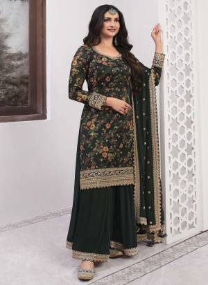 Attrective Looking These Sharara Suit in Fine Colored Pair With Bottom And Dupatta.These Top Are Georgette And Dupatta Are Fabricated On Fancy Pair With Fancy Bottom.Its Beautified With Designer Digital Printed With Heavy Embroidery Work.