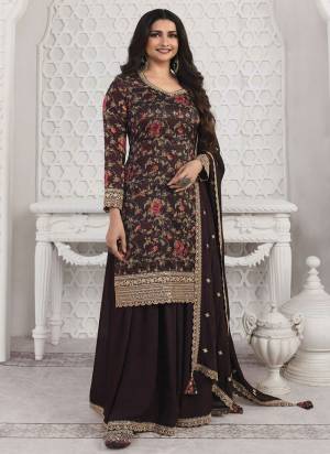 Attrective Looking These Sharara Suit in Fine Colored Pair With Bottom And Dupatta.These Top Are Georgette And Dupatta Are Fabricated On Fancy Pair With Fancy Bottom.Its Beautified With Designer Digital Printed With Heavy Embroidery Work.