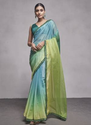 Attrective These Fancy Saree in Fine Colored.These Saree Are Organza And Blouse is Fabricated On Art Silk Pair.Its Beautified With Pedding Disigner.