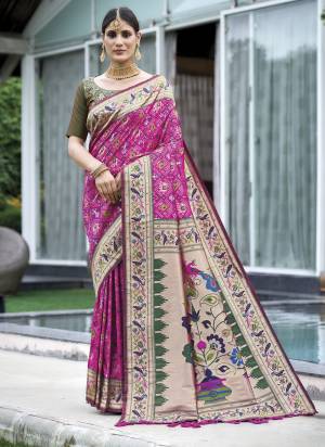 Garb These Party Wear Saree in Fine Colored.These Saree And Blouse is Fabricated On Soft Banarasi Silk.Its Beautified With Patola Meenakari,Jari Wevon Designer.