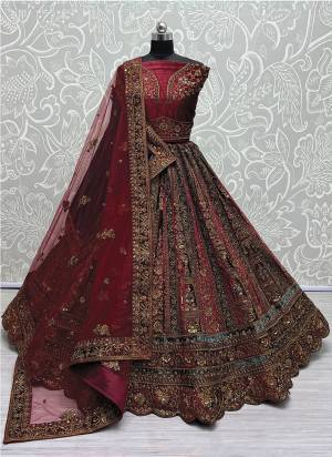 For A Fancy Designer Look,Grab These Lehenga Choli With 2 Dupatta in Fine Colored.These Lehenga And Choli Are Velvet And Dupatta Are Fabricated On Soft Net And Velvet Pair.Its Beautified With Designer Multy Thread,Sequance,Dori,Jari Embroidery,Diamond Work.