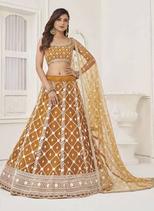 For A Different Look,Grab These Party Wear Designer Lehenga in All Over Pretty Colored Pair With Blouse And Dupatta.These Lehenga Choli And Dupatta is All Over Butterfly Net Base Fabric With Designer Thread,Sequance Embroidery Work.