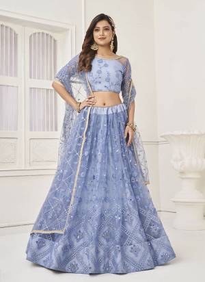 For A Different Look,Grab These Party Wear Designer Lehenga in All Over Pretty Colored Pair With Blouse And Dupatta.These Lehenga Choli And Dupatta is All Over Butterfly Net Base Fabric With Designer Thread,Sequance Embroidery Work.