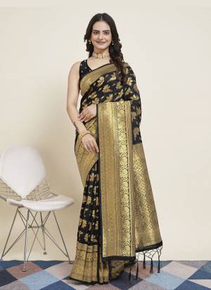 Garb This Partywear Saree Paired With Blouse.This Saree And Blouse Are Silk Based Fabric With Weaving Jari Heavy Designer. Buy This Pretty Saree Now.