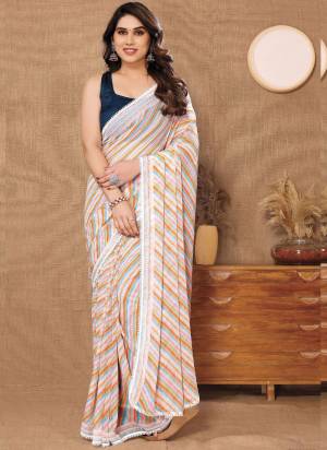 Garb These Party Wear Saree in Fine Colored.These Saree Are Georgette And Blouse is Fabricated On Banglori Pair.Its Beautified With Designer Printed With Lace Border.