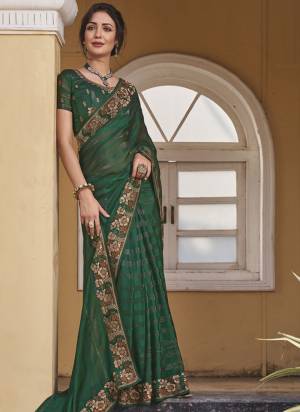 Attrective These Fancy Party Wear Saree in Fine Colored.These Saree And Blouse is Fabricated On Fancy Art Silk Pair.Its Beautified With Wevon Patta,Heavy Embroidery, Swarovski Work.