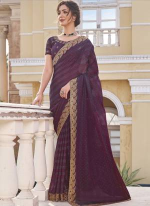 Attrective These Fancy Party Wear Saree in Fine Colored.These Saree And Blouse is Fabricated On Fancy Art Silk Pair.Its Beautified With Wevon Patta,Heavy Embroidery, Swarovski Work.