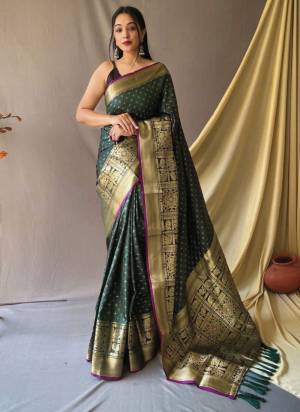 Garb This Partywear Saree Paired With Blouse.This Saree And Blouse Are Soft Silk Based Fabric With Weaving Jari Heavy Designer. Buy This Pretty Saree Now.