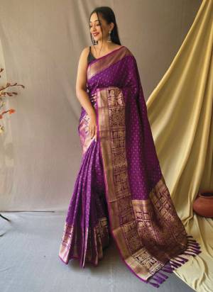 Garb This Partywear Saree Paired With Blouse.This Saree And Blouse Are Soft Silk Based Fabric With Weaving Jari Heavy Designer. Buy This Pretty Saree Now.