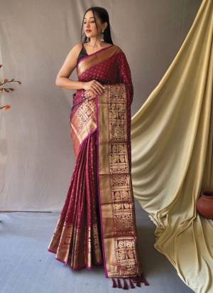 Garb This Partywear Saree Paired With Blouse.This Saree And Blouse Are Soft Silk Based Fabric With Weaving Jari Heavy Designer. Buy This Pretty Saree Now.