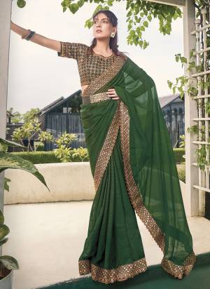 Looking These Fancy Party Wear Saree in Fine Colored.These Saree Are Zomato Shimmer And Blouse is Fabricated On Art Silk Pair.Its Beautified With Heavy Mirror,Jari Embroidery Work.