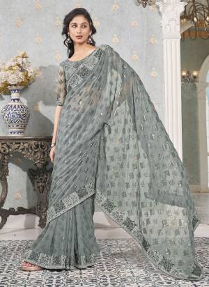 Attrective These Fancy Party Wear Saree in Fine Colored.These Saree And Blouse is Fabricated On Faux Georgette Pair.Its Beautified With Heavy Sequance Embroidery Work.