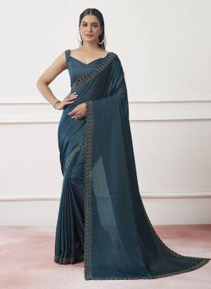 Garb These Party Wear Saree in Fine Colored.These Saree Are Barfi And Blouse is Fabricated On Fancy Art Silk Pair.Its Beautified With Heavy Swarovski Work.