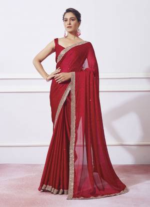 Garb These Party Wear Saree in Fine Colored.These Saree Are Barfi And Blouse is Fabricated On Fancy Art Silk Pair.Its Beautified With Heavy Swarovski Work.