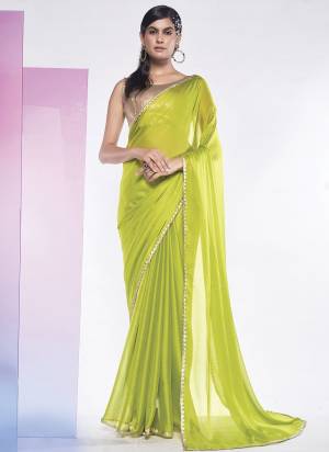 Looking These Party Wear Saree in Fine Colored.These Saree Are Georgette And Blouse is Fabricated On Fancy Art Silk Pair.Its Beautified With Solid Designer.