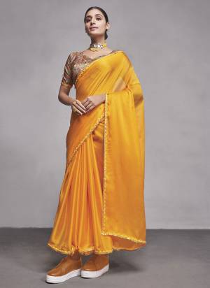 Looking These Party Wear Saree in Fine Colored.These Saree Are Georgette And Blouse is Fabricated On Fancy Art Silk Pair.Its Beautified With Solid Designer.