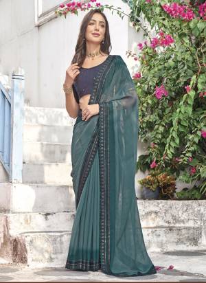 Garb These Fancy Saree in Fine Colored.These Saree Are Shimmer And Blouse is Fabricated On Art Silk Pair.Its Beautified With Pedding Color With Embroidery Work Border Blouse Disigner.