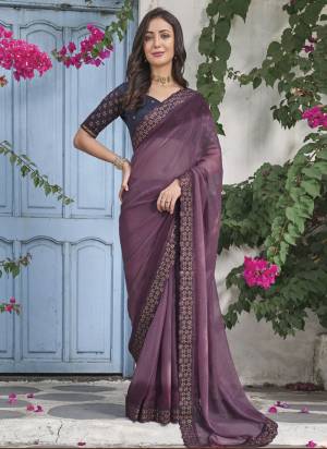 Garb These Fancy Saree in Fine Colored.These Saree Are Shimmer And Blouse is Fabricated On Art Silk Pair.Its Beautified With Pedding Color With Embroidery Work Border Blouse Disigner.