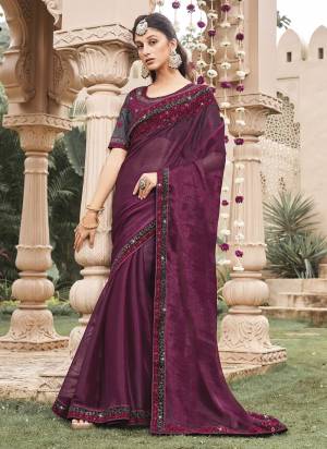 Looking These Fancy Party Wear Saree in Fine Colored.These Saree Are Shimmer And Blouse is Fabricated On Art Silk Pair.Its Beautified With Blooming Color With Heavy Embroidery Work Border Blouse.