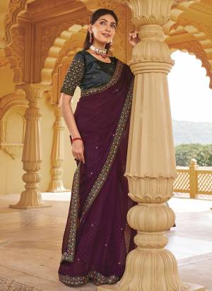 Looking These Fancy Party Wear Saree in Fine Colored.These Saree Are Shimmer And Blouse is Fabricated On Art Silk Pair.Its Beautified With Blooming Color With Heavy Embroidery,Swarovski Work Border Blouse.