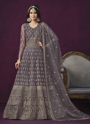 Attrective These Anarkali Suit in Fine Colored Pair With Bottom And Dupatta.These Top And Dupatta Are Fabricated On Net Pair With Santoon Bottom.Its Beautified With Santoon Inner.Its Beautified With Designer Heavy Sequance Embroidery Work.