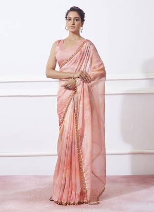 Garb These Party Wear Saree in Fine Colored.These Saree Are Organza And Blouse is Fabricated On Fancy Art Silk Pair.Its Beautified With Prizam Printed Designer With Moti Lace.