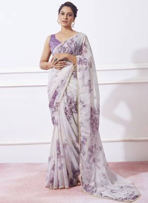 Garb These Party Wear Saree in Fine Colored.These Saree Are Organza And Blouse is Fabricated On Fancy Art Silk Pair.Its Beautified With Prizam Printed Designer With Moti Lace.