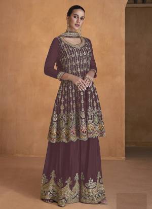 Garb These Designer Plazzo Suits in Fine Colored Pair With Dupatta.These Top And Dupatta Are Fabricated On Georgette Pair With Georgette Bottom.Its Beautified With Heavy Designer Embroidery Work.