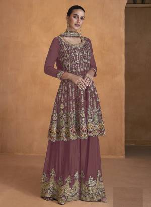 Garb These Designer Plazzo Suits in Fine Colored Pair With Dupatta.These Top And Dupatta Are Fabricated On Georgette Pair With Georgette Bottom.Its Beautified With Heavy Designer Embroidery Work.