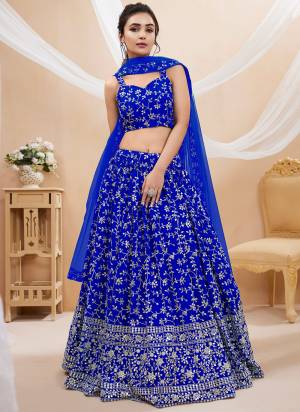 For A Designer Look,Grab These Lehenga Choli in Fine Colored.These Lehenga And Choli Are Fabricated On Georgette Pair With Soft Net Dupatta.Its Beautified With Designer Sequance,Jari Embroidery Work.