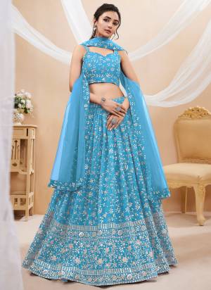 For A Designer Look,Grab These Lehenga Choli in Fine Colored.These Lehenga And Choli Are Fabricated On Georgette Pair With Soft Net Dupatta.Its Beautified With Designer Sequance,Jari Embroidery Work.