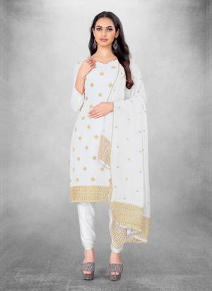 Garb This Suits In Fine Color.Its Pretty Top Is Georgette Based Paired Bottom Santoon And Georgette Fabricated Dupatta Are Designer Jari Embroidery Work. Which Gives An Attractive To The Dress.