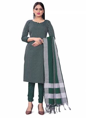 Garb This Suits In Lovely Color.Its Pretty Top Is Cotton Based Paired Bottom Cotton And Cotton Fabricated Dupatta Are Wevon Designer. Which Gives An Attractive To The Dress.