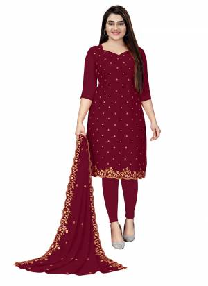 Garb This Suits In Fine Color.Its Pretty Top Is Georgette Based Paired Bottom Santoon And Georgette Fabricated Dupatta Are Designer Embroidery Work. Which Gives An Attractive To The Dress.