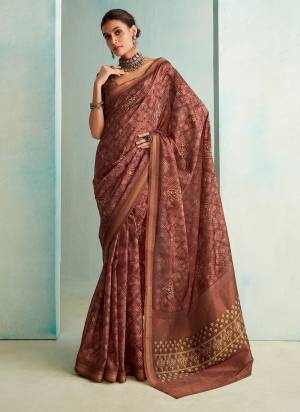 Looking These Party Wear Saree in Fine Colored.These Saree And Blouse is Fabricated On Jute Silk.Its Beautified With Weaving Jari Border  Designer,Printed.