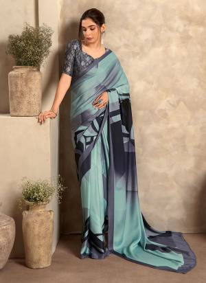 Looking These Party Wear Saree in Fine Colored.These Saree And Blouse is Fabricated On Satin Crepe.Its Beautified With Designer Digital Printed.