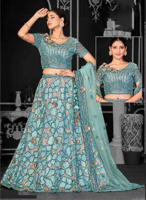 For A Designer Look,Grab These Lehenga Choli in Fine Colored.These Lehenga And Dupatta Are Fabricated On Net Pair With Net Blouse.Its Beautified With Designer Cord Embroidery With Beads & Stone ,Applique Work.