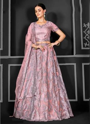 For A Designer Look,Grab These Lehenga Choli in Fine Colored.These Lehenga And Dupatta Are Fabricated On Net Pair With Net Blouse.Its Beautified With Designer Cord Floral Sequance Embroidery With Applique Work.